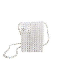 Detail shot of handcrafted pearl crossbody bag with iridescent faceted beads texture