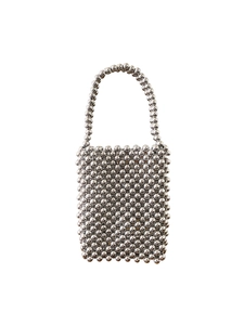 Handmade silver woven beaded handbag with metallic beads and top handle on white background