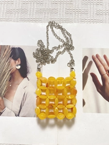 Handmade amber yellow acrylic beaded crossbody mini bag with slim silver metal chain strap