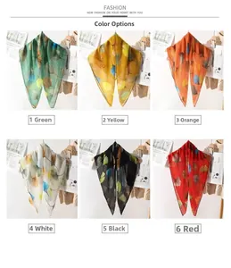 Detail of pleated summer scarves showing diverse ginkgo leaf patterns in six colors