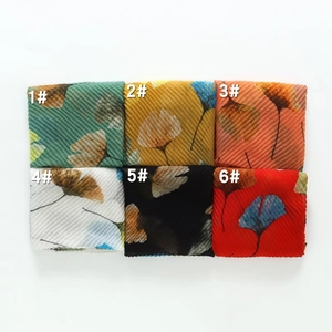 Lightweight pleated ginkgo leaf print scarves in six vibrant summer fashion colors