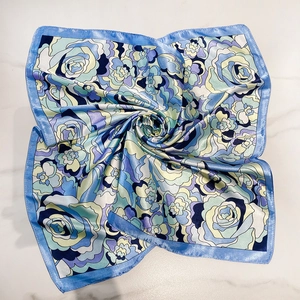 Elegant blue floral satin square scarf with premium silk texture and abstract rose patterns