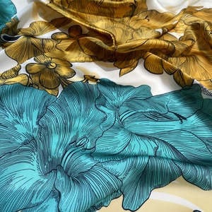Elegant silk texture scarf with vintage blue and yellow floral prints and smooth satin finish