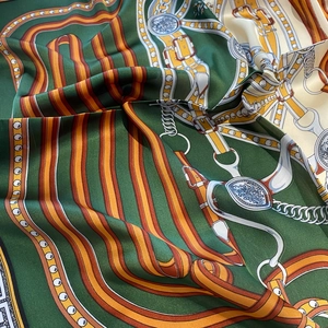 Satin silk scarf featuring classic equestrian chain print and equestrian emblem designs