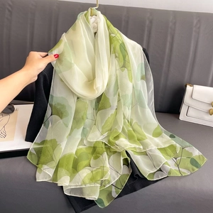 Extra large sheer leaf print sun protection scarf in light green and beige tones