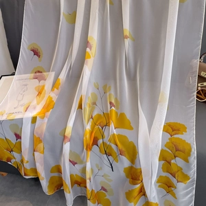 Sheer white silk scarf with yellow ginkgo leaf print for summer beach sun protection