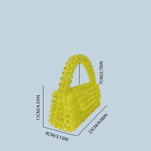 Detailed view of yellow beaded trapezoid handbag with precise size measurements shown