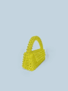 Handmade yellow acrylic beaded trapeze handbag with flap closure and woven top handle