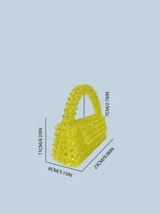 Yellow beaded trapezoid handbag with dimensions 23x8x11cm and top handle