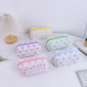 Quilted floral pencil case set with colorful zippers for stationery and cosmetic storage
