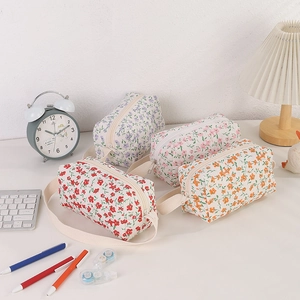 Floral canvas stationery bags with zippers and handles in four various pastel colors