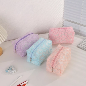 Mesh floral embroidery makeup bags in four pastel colors with zippers for daily storage