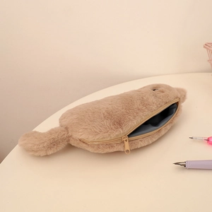 Detail of soft plush capybara pencil case with top zipper and spacious grey lining