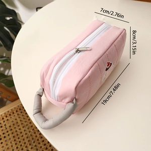 Pink canvas pencil case details showing dimensions 19x8x7cm with a cute cake patch