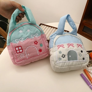 Quilted cotton handheld bag with house-shaped design and colorful embroidery detail