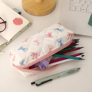 Trousse à nœuds matelassée avec fermeture éclair rose et grand compartiment intérieur