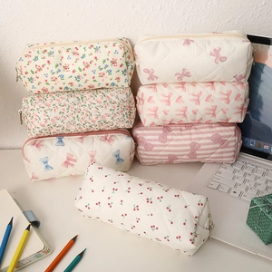 Trousse à crayons matelassée avec nœud floral et fermeture éclair pour l'école ou beauté