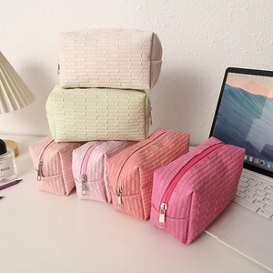 Pastel quilted cosmetic bag with large capacity and metal zipper closure for travel