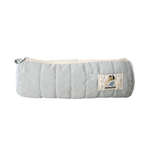 Astuccio cilindrico trapuntato blu con etichetta carina e chiusura a zip color avorio