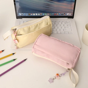 Cute large capacity plush stationery bag in yellow and pink colors with cartoon pendant