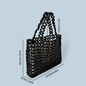 Detail view of black beaded tote bag showing dimensions and glossy hand-woven texture