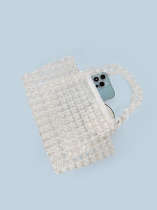 Handmade clear beaded handbag with white inner pouch and zipper for small items