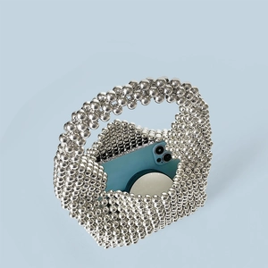Detail of silver beaded handbag showing internal space with a smartphone placeholder