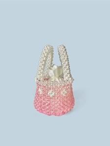 Handmade pink and white beaded bucket bag with elegant pearl handle for summer beach style