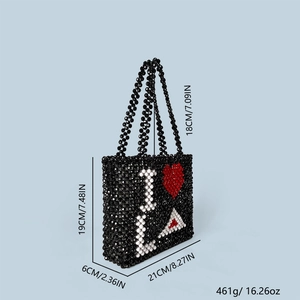 Detailed size and weight specs for the handmade beaded heart tote bag with measurements