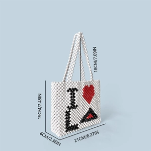 Three-dimensional view of handmade beaded bag showing precise dimensions and heart pattern