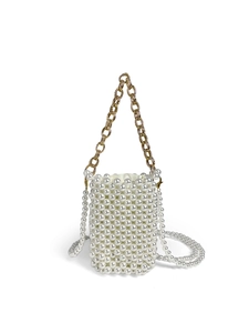 Detail of handmade pearl beaded mini bag featuring a gold metal chain handle and satin lining