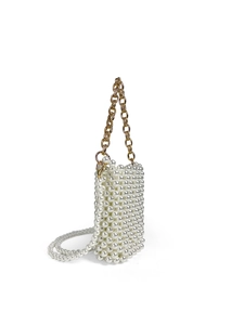 Detail of handmade pearl beaded mini bag with gold chain strap and crossbody pearl strap