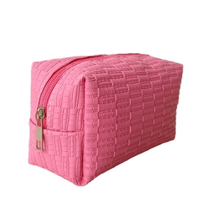 Rose pink quilted cosmetic bag with large capacity and durable zipper closure
