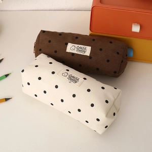 Polka dot corduroy pencil cases in brown and cream with Colorful Fantasy label