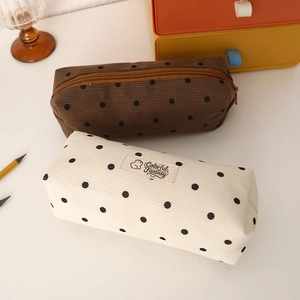 Polka dot corduroy pencil cases in coffee and cream white colors with zipper closure