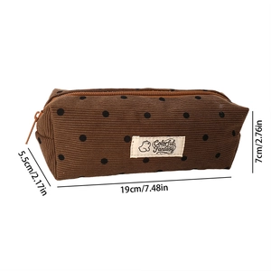 Detailed view of brown corduroy polka dot pencil case with dimensions and logo patch