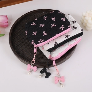 Floral bow fabric coin purse and cosmetic bag with pearl pendant in two colors