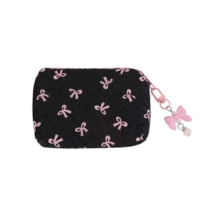 Quilted black pouch with pink bow prints and decorative faux pearl charm accessory