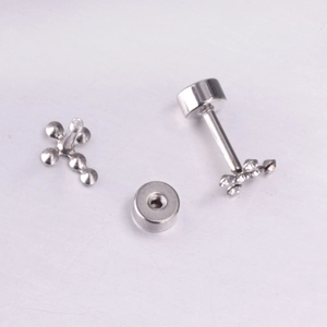 Detailed view of silver stainless steel cross earrings with zircon and screw back closure