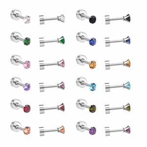 Vue macro de 12 couleurs de piercings labret en zircone et acier inoxydable poli brillant