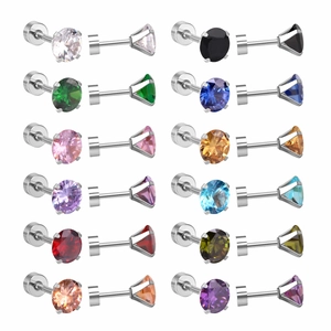 Détail de douze paires de boucles d'oreilles rondes multicolores avec fermoirs à vis