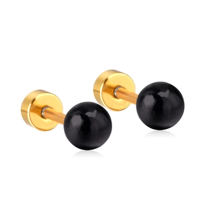 Minimalist black bead stud earrings with gold pins shown from a top-down view