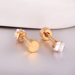 Detailed view of square gold earrings with clear cubic zirconia and flat metal screw backs