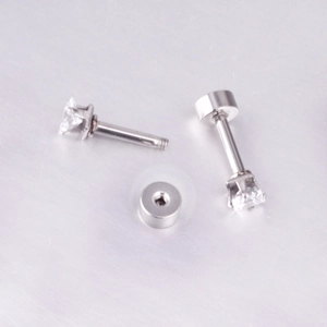 Macro view of square princess cut cubic zirconia studs with secure screw-back closure