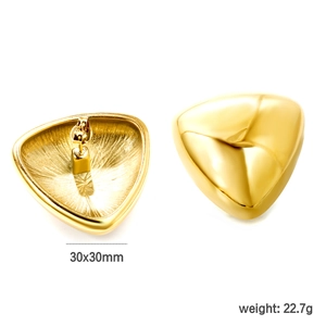 Detail view of large gold geometric triangle stud earrings with 30x30mm size dimensions