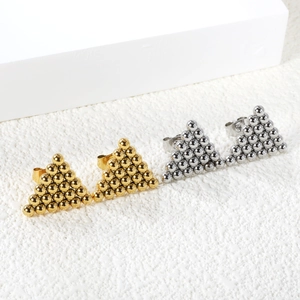 Detailed close-up of geometric steel bead triangle earrings in gold and silver finishes