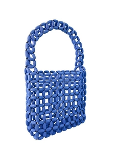 Handmade woven bead handbag in Klein blue featuring vintage aesthetic and top handle design