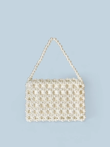 Handmade woven faux pearl handbag with elegant top handle in a minimalist vintage style
