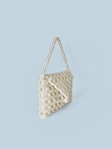 Handmade woven pearl beaded handbag with elegant top handle and faux pearl flap design