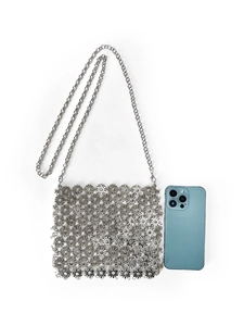 Detail of silver petal metal chain bag with smartphone for size comparison